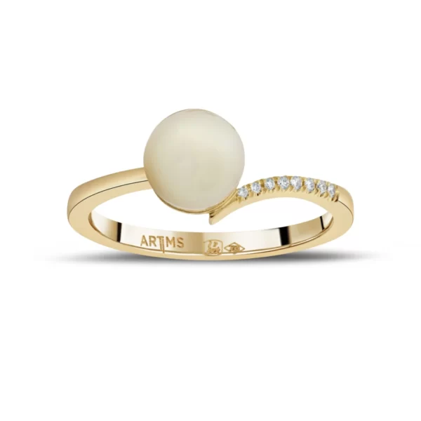 bague en or jaune 18K avec une perle et diamants VS