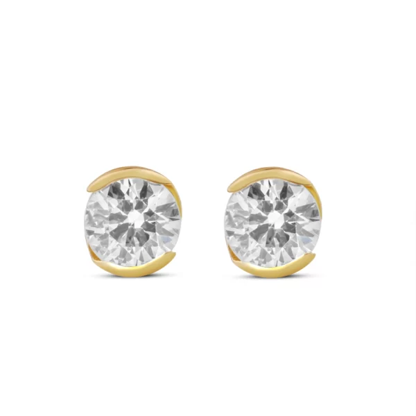 boucles d'oreilles en or jaune 18K avec un diamant rond VS 0,32 cts