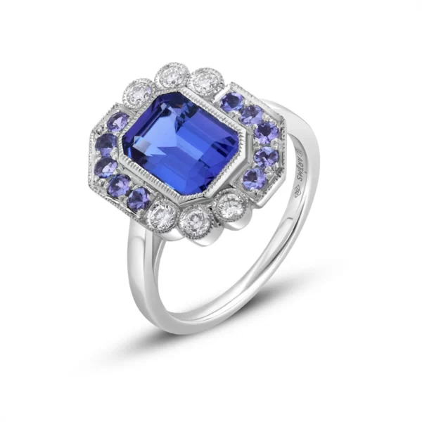 Ring in white gold 18K with a tanzanite central stone, diamonds and tanzanite 2 mm stones