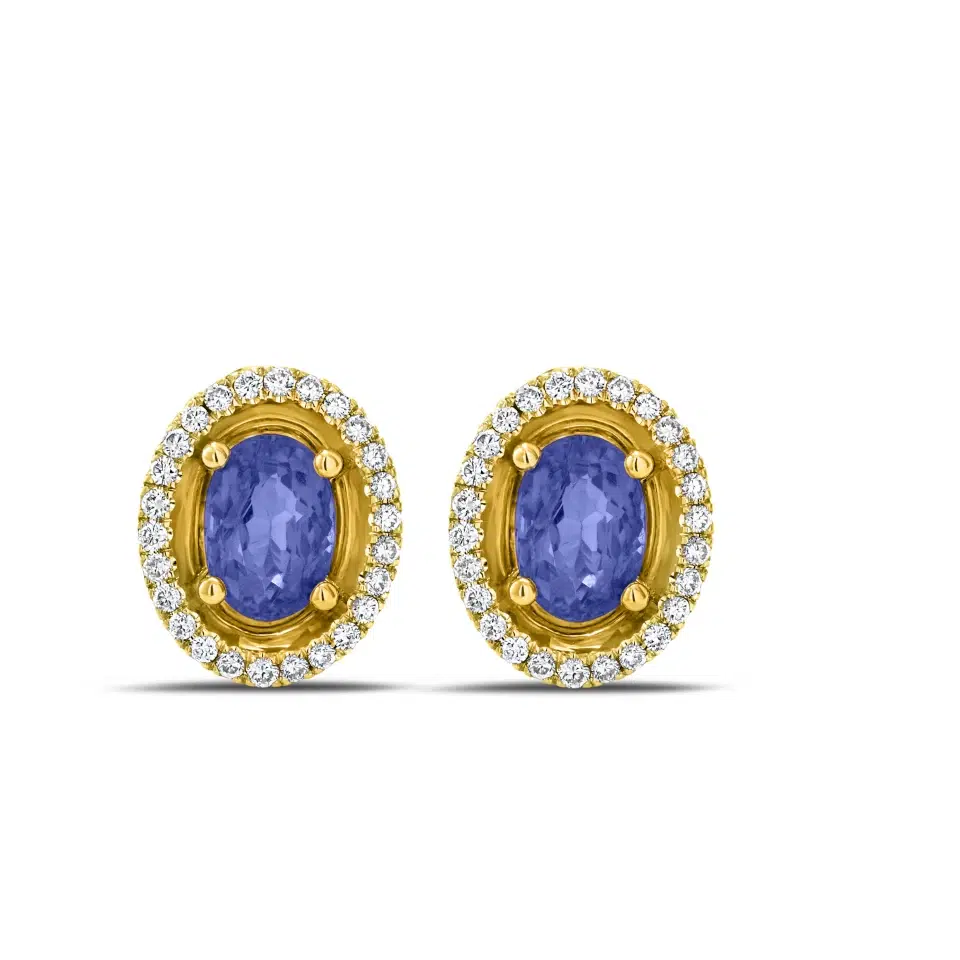 Pair of Aurore earrings in 18K white gold with oval tanzanites and a diamond halo