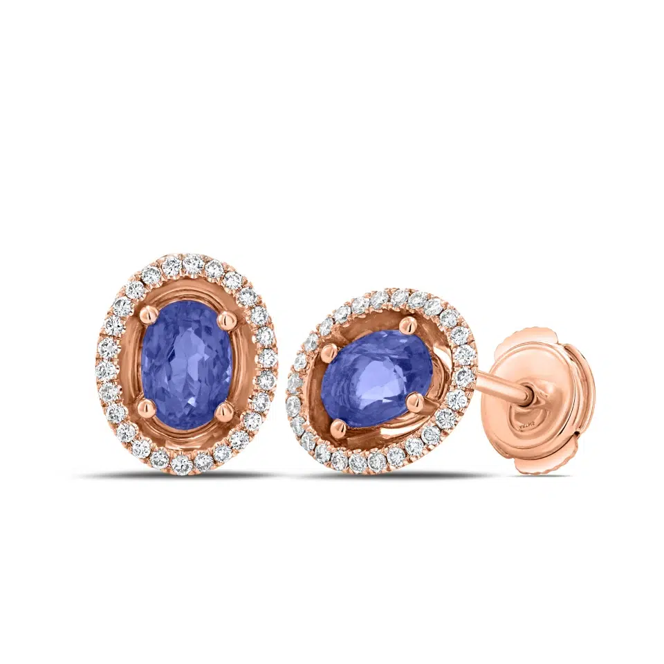 Pair of Aurore earrings in 18K white gold with oval tanzanites and a diamond halo