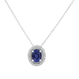 Aurore necklace in 18K gold with an oval tanzanite surrounded by 27 round diamonds on a fine chain