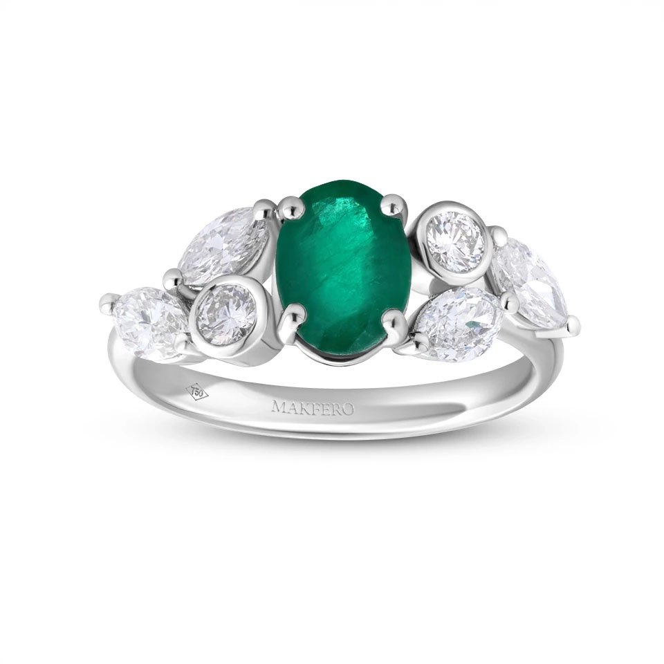 White gold ring with an oval emerald, 7.75 × 5.75 mm, two round diamonds, and four marquise diamonds in a floral design