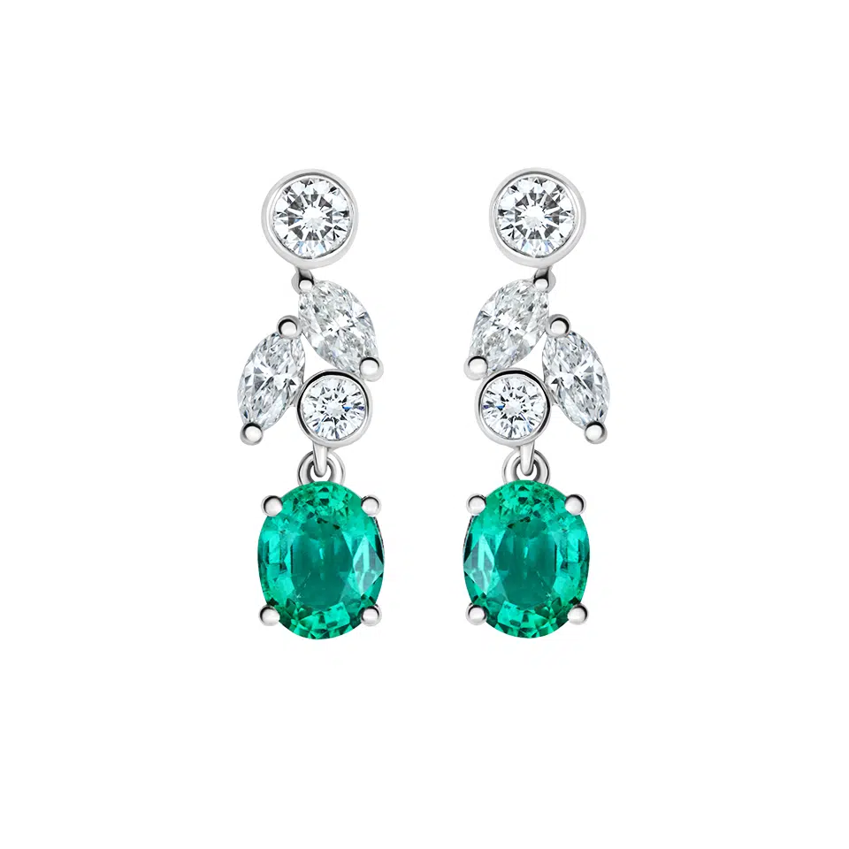 Pair of Carya earrings in 18K white gold with oval emeralds and marquise and round diamonds