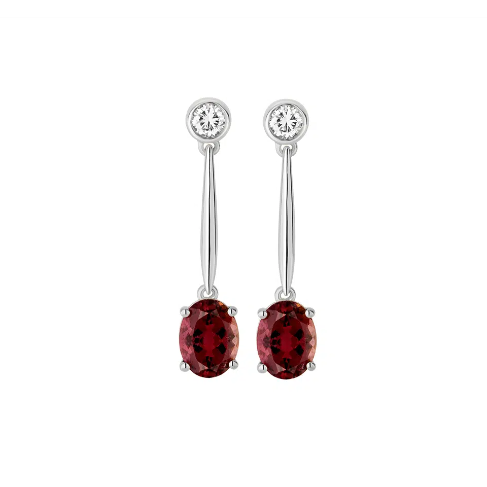 Pair of Exolia earrings in 18K white gold with oval red tourmalines and round diamonds