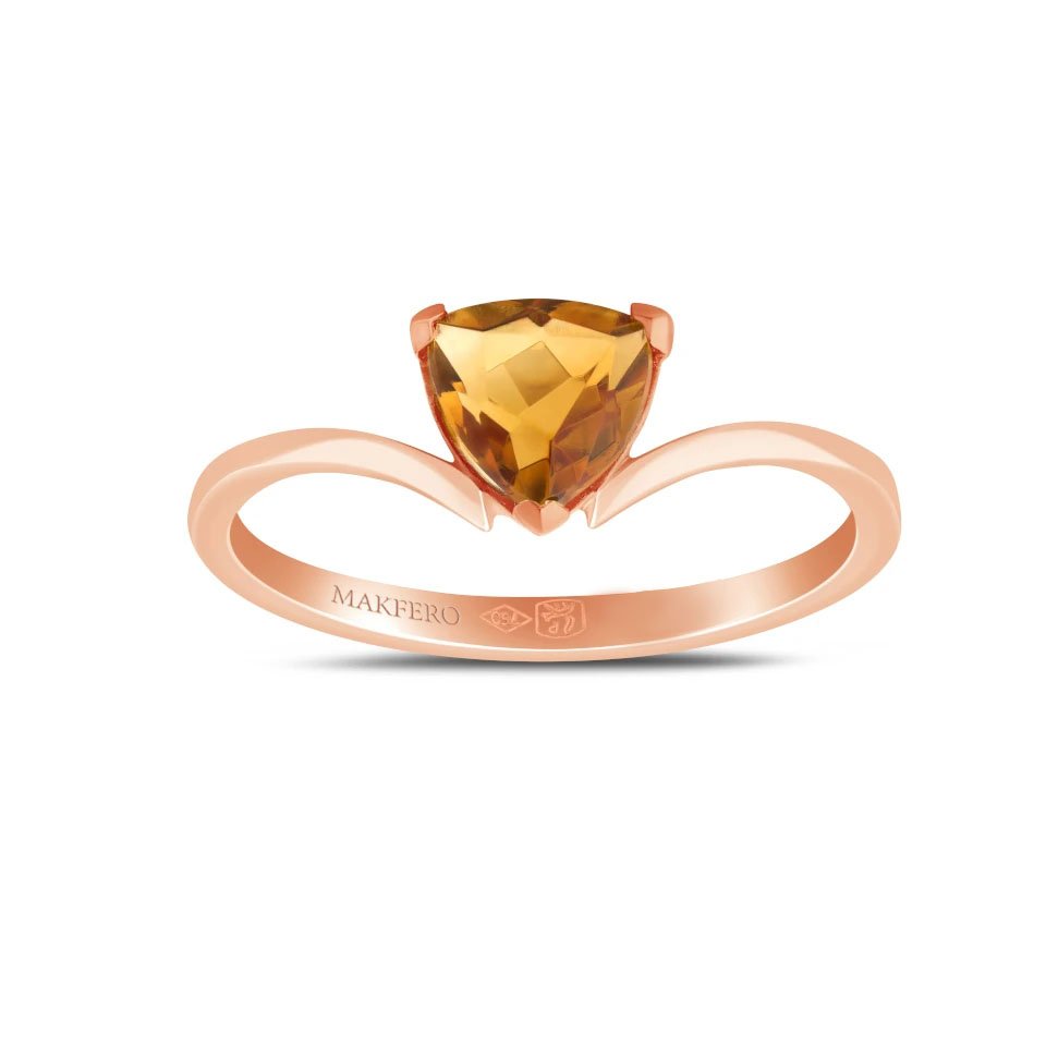Rose gold ring with curved band set with a triangular trillion-cut tourmaline