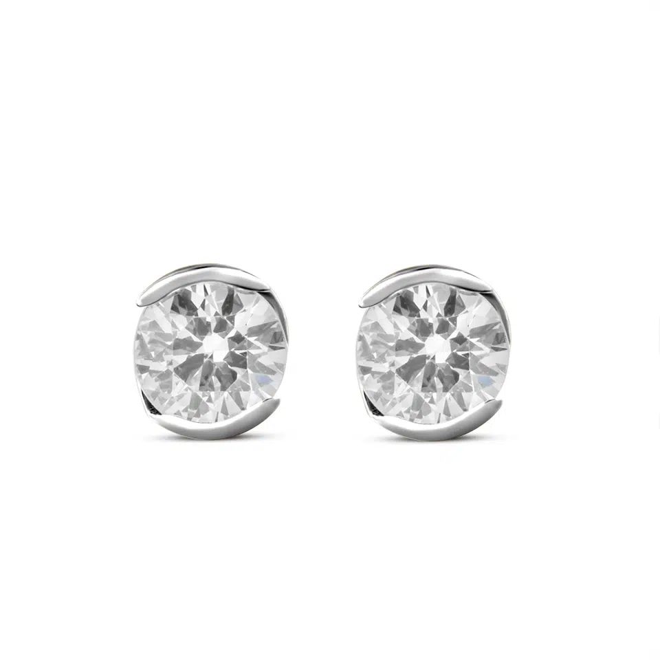 Pair of Prélude earrings in 18K white gold set with two round brilliant diamonds