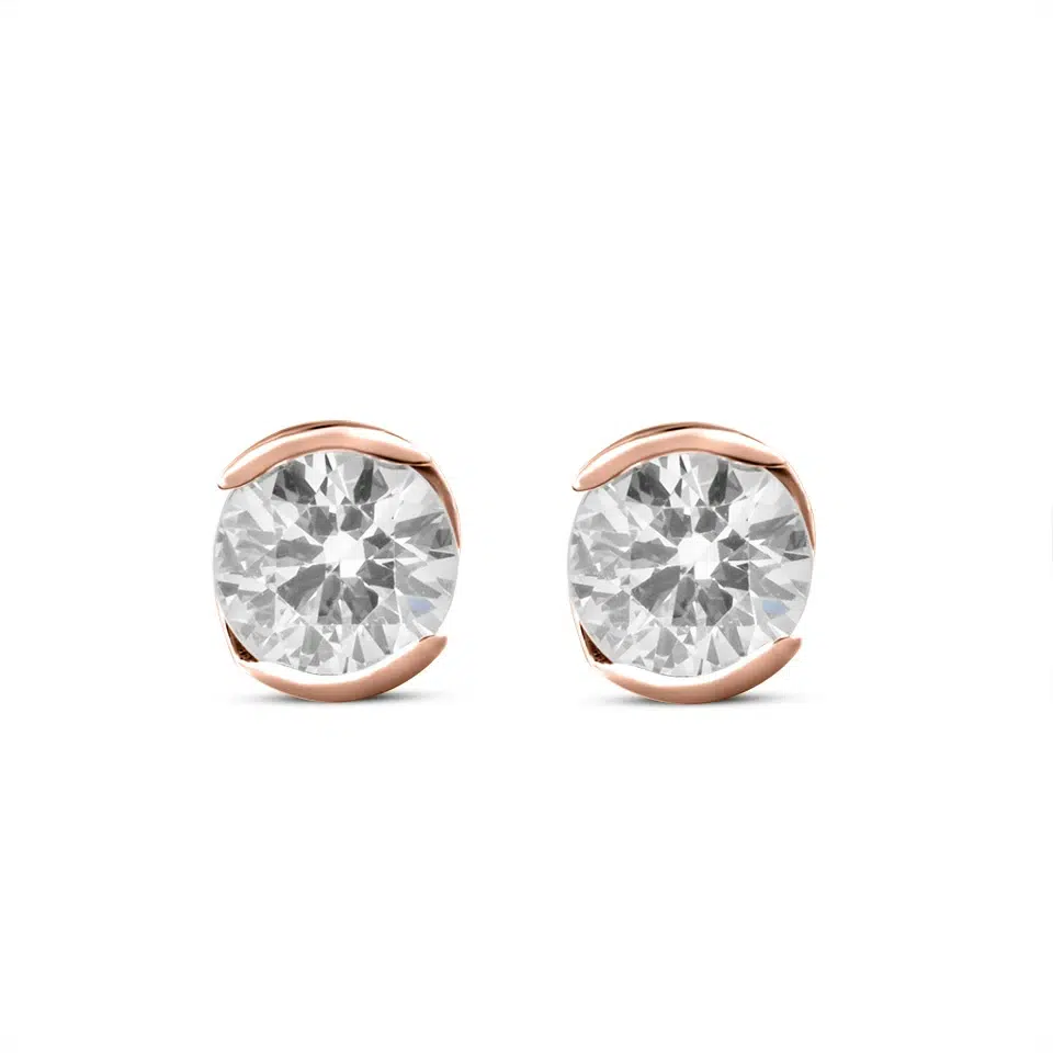 Pair of Prélude earrings in 18K white gold set with two round brilliant diamonds