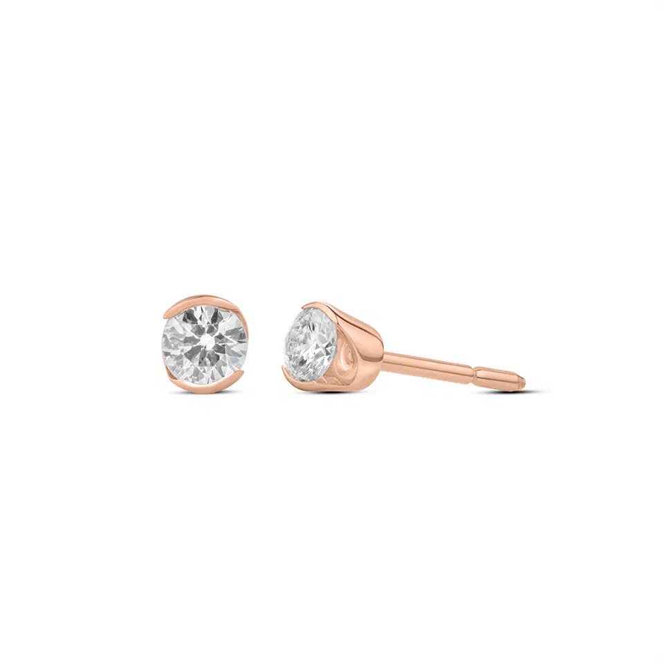 Pair of Prélude earrings in 18K white gold set with two round brilliant diamonds