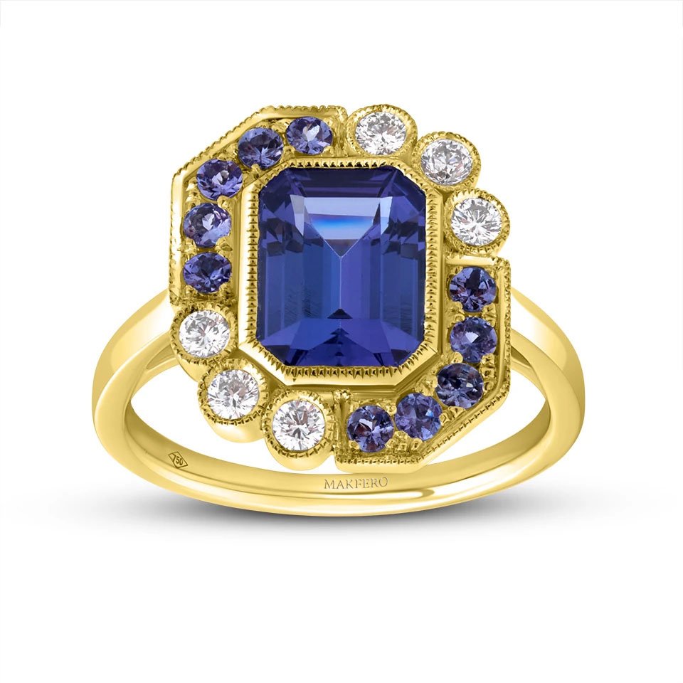 Yellow gold ring with a central emerald-cut tanzanite, 7 × 9 mm, surrounded by six round diamonds and ten round tanzanites in a geometric halo design