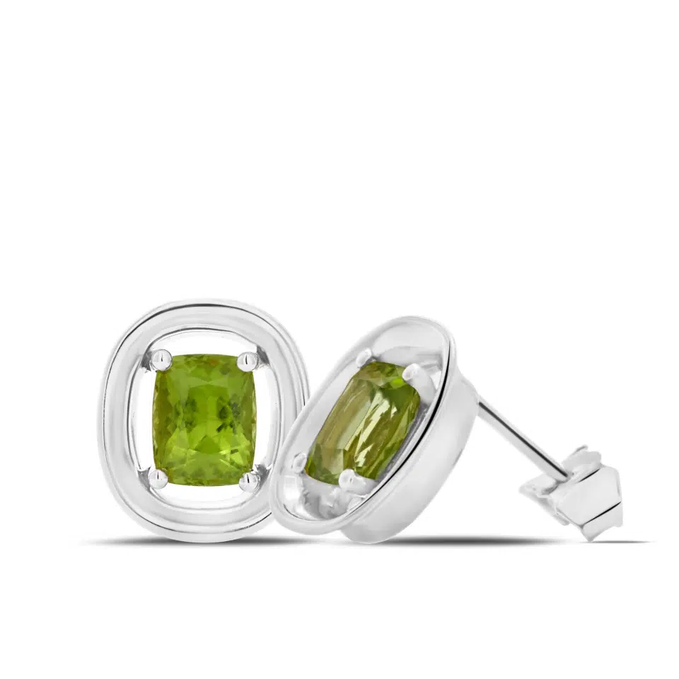 Pair of Tiare earrings in 18K white gold set with two cushion-cut peridots