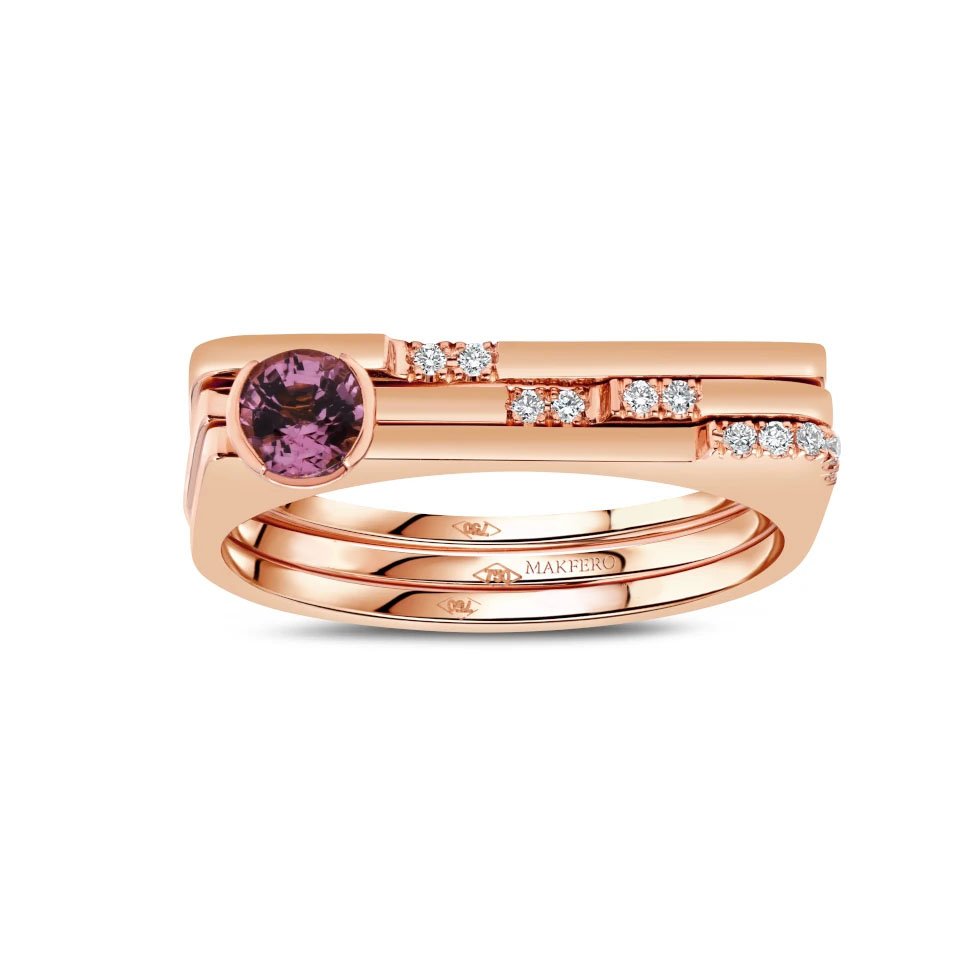 Rose gold ring combining tourmaline center stone with eleven small round diamonds set in a geometric modern band