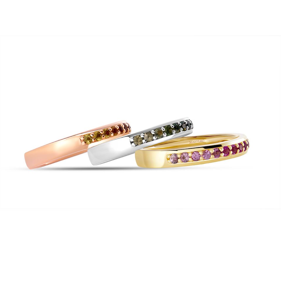 Zea ring in 18K gold, set with 16 round sapphires of 2 mm in a delicate gradient of colors
