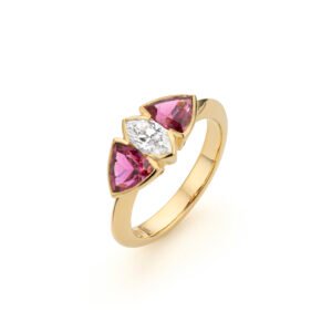 Yellow gold ring with a central marquise diamond and two trillion-cut rubellites on the sides