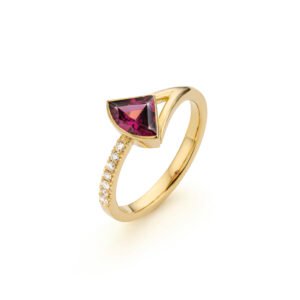 Yellow gold ring with a geometric-cut rhodolite and a row of diamonds along the band